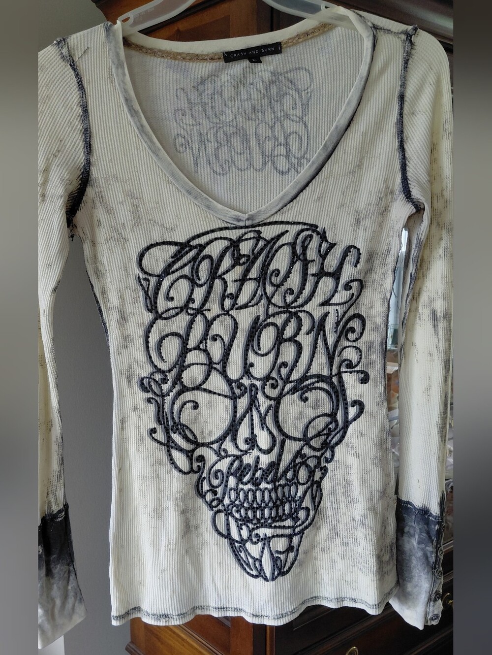 Crash & Burn White Long Sleeve V-Neck Top with Black Skull Embroidery